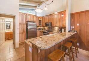 Bright open kitchen. Plenty of space to cook and entertain