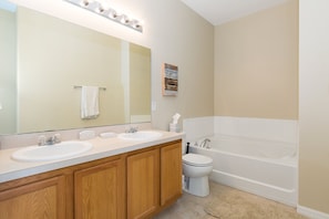 Master Bath, Double Sinks, Spa Tub, and Stand Up Shower