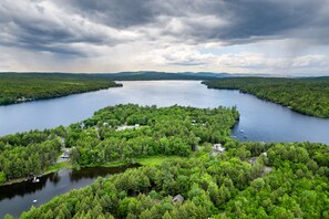 Private lake access with a dock in protected cove, and quiet surroundings on Sebec Lake which is 11 miles long and perfect for fishing and water sports.