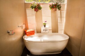 Bathroom 1 with large bath tub and separate walk- in shower