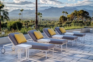 Property features a dozen custom designed chaise lounges.