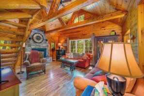 The living room has a gas fireplace, perfect for cold evenings!