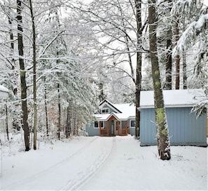 Long driveway provides plenty of parking in addition to front of garage.