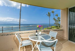 View from lanai of Pacific ocean, Mount Haleakala and Molokini Crater.