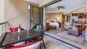 A full wall folding glass doors to enjoy the tropical breezes