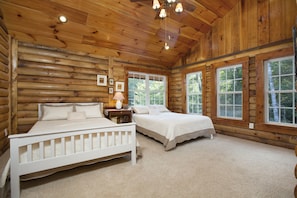 Bedroom 2 = 2 Queen Beds & Overlooks the pond and waterfall. Sleeps 4