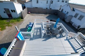 Large Deck with Games and beach stuff in deck bin.