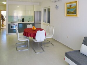 Room, Property, Furniture, Interior Design, Floor, Building, Yellow, Table, Living Room, Real Estate