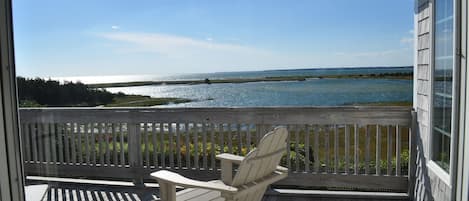 Enjoy the view from the deck with a book and a glass of wine!