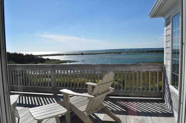 Enjoy the view from the deck with a book and a glass of wine!