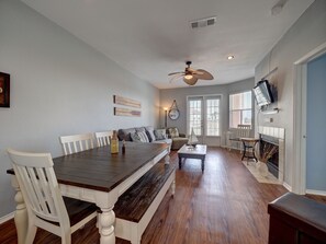 Seating for all 6 at the dinner table.  Open floor plan.