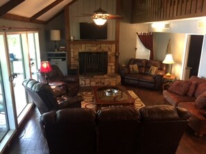 Relax in the family room. Cold AC for hot summer + fireplace for cold winter 