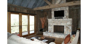 Rustic details with an eye for design are throughout the romantic cabin.