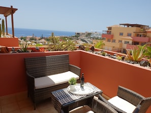 Here you can sit with a glass of wine and enjoy the view to the sea!