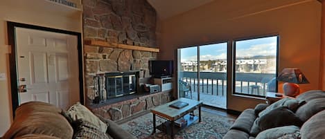 The Pines at Meadow Ridge 41-12 - a SkyRun Winter Park Property - Large couch to relax and unwind after a long day playing in the Mountains 