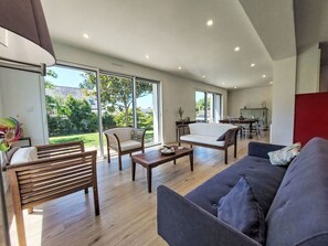 Furniture, Property, Couch, Comfort, Houseplant, Plant, Wood, Chair, Living Room, Flooring