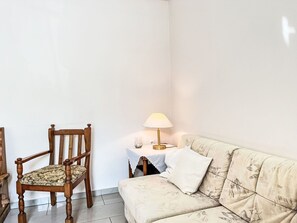 Furniture, Wall, Interior Design, Flooring, Floor, Wood, Room, Couch, Lighting, Living Room