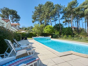 Water, Plant, Sky, Property, Swimming Pool, Chair, Tree, Outdoor Furniture, Shade, Grass