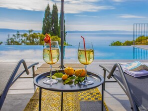 Water, Sky, Cloud, Tableware, Table, Property, Azure, Outdoor Furniture, Interior Design, Leisure