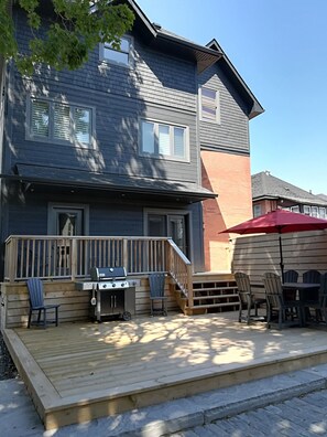 Back of house. Shared deck with property manager