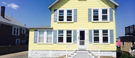 Front view: Parking for two cars (front to back) directly in front of home