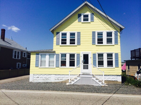 Front view: Parking for two cars (front to back) directly in front of home