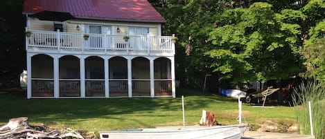 The rear of the house faces the lake.  Our dock provides easy boat access.