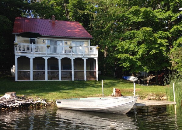 The rear of the house faces the lake.  Our dock provides easy boat access.