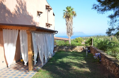 Sardinia Golfo Aranci garden apartment overlooking the sea 300 m. from the beach