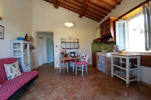 Capitorio, living room and kitchen corner 