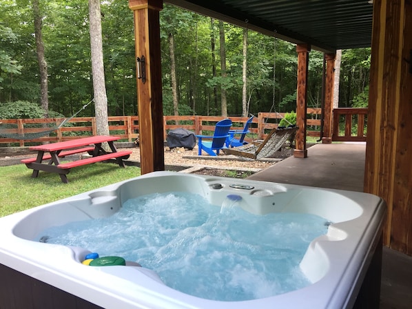 Hot tub on the back porch.  We change the water between every guest.