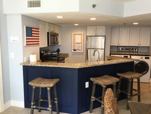 Additional seating at the breakfast bar.  USB outlet for charging.  