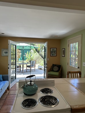 French doors open up to outdoor patio.