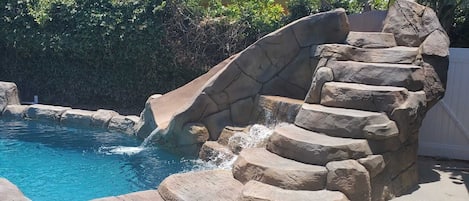 Renovated pool and rockslide.