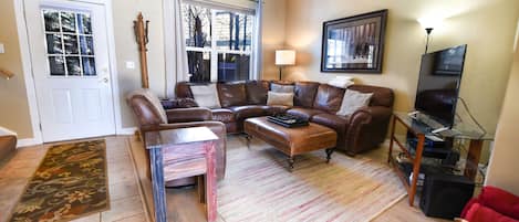 Living Room Area - Living room with a flat screen TV and fireplace.