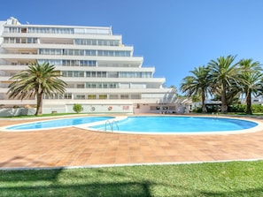 Building, Water, Plant, Sky, Swimming Pool, Tree, Leisure, Arecales, Grass, Composite Material