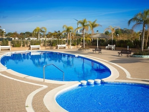 Water, Sky, Property, Blue, Swimming Pool, Azure, Tree, Architecture, Arecales, Leisure