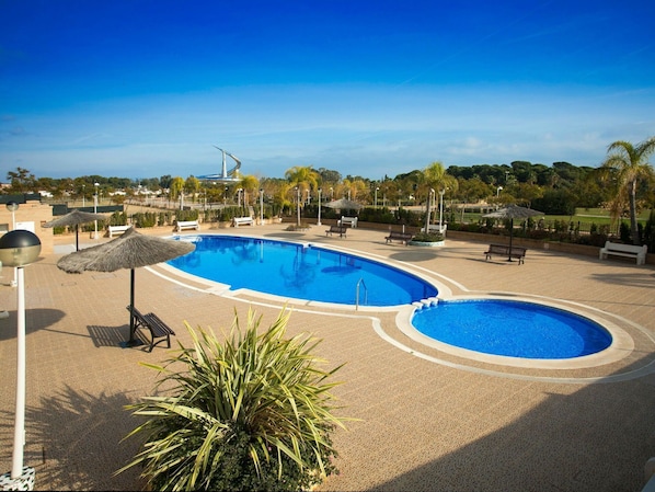 Sky, Water, Plant, Property, Tree, Shade, Swimming Pool, Arecales, Leisure, Landscape