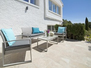 Furniture, Window, Building, Sky, Table, Shade, Plant, Outdoor Furniture, Road Surface, Interior Design