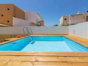 Water, Plant, Property, Sky, Swimming Pool, Light, Azure, Rectangle, Shade, Building