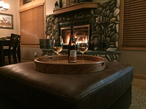 Cozy River Rock Fireplace. Ready to relax?
