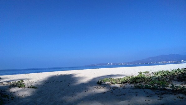Sandy white beach at two blocks, walking distance