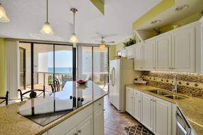 Kitchen has a great cooktop with a view while cooking!
