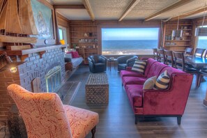 Living/dining combination with fantastic ocean views. (The fireplace is decorative only.)