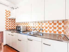 Kitchen, Countertop, Interior Design, Flooring, Plumbing Fixture, Cabinetry, Kitchen Appliance, Kitchen Sink, Floor, Sink