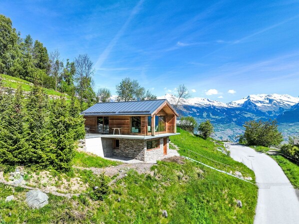 Plant, Sky, Cloud, Property, Mountain, Natural Landscape, Tree, Cottage, Grass, Leisure