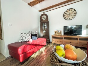 Furniture, Interior Design, Flooring, Wall, Floor, Wood, Room, Couch, Living Room, Picture Frame