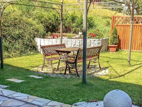 Plant, Property, Furniture, Chair, Outdoor Furniture, Botany, Tree, Table, Shade, Grass