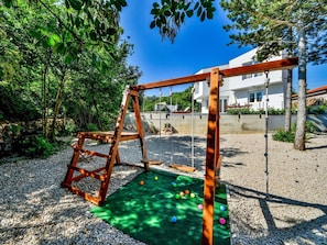Playground, Nature, Public Space, Outdoor Play Equipment, Green, Human Settlement, Tree, Leisure, Sky, City