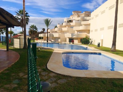 2-bedroom apartment right on the beach with 100m² large terrace; Wi-Fi; Pool